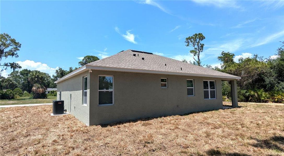 Exterior details and patio area of a home in , Sebring (Image 15).
