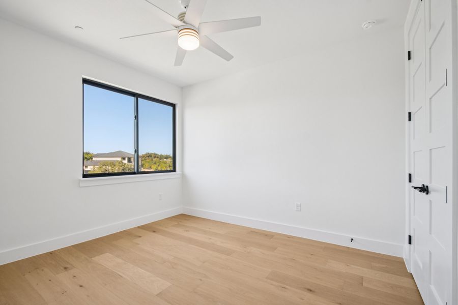 Spacious, unfurnished interior of a new home in Milky Way at River Place, Austin (Image 45).