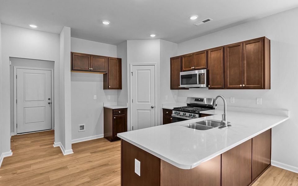 Furnished interior view inside a new home in Hanes Lake, Winston-Salem (Image 14). Furnished interior view inside a new home in Hanes Lake, Winston-Salem (Image 14).