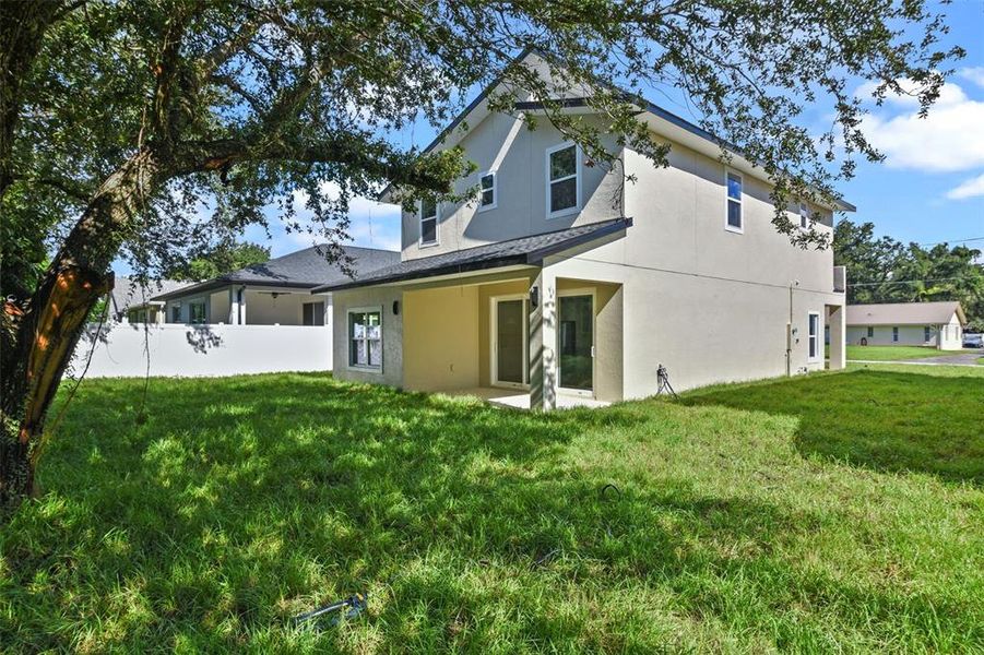 Front exterior of a new home in , Orlando, FL, highlighting curb appeal (Image 27). Front exterior of a new home in , Orlando, FL, highlighting curb appeal (Image 27).