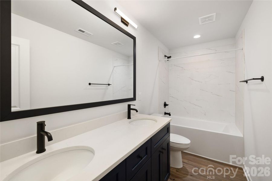 Representative Photo: Guest Bathroom Upper Level Representative Photo: Guest Bathroom Upper Level