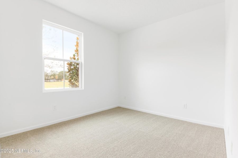 Spacious, unfurnished interior of a new home in Seasons at Grandview Gardens, Deland (Image 10).