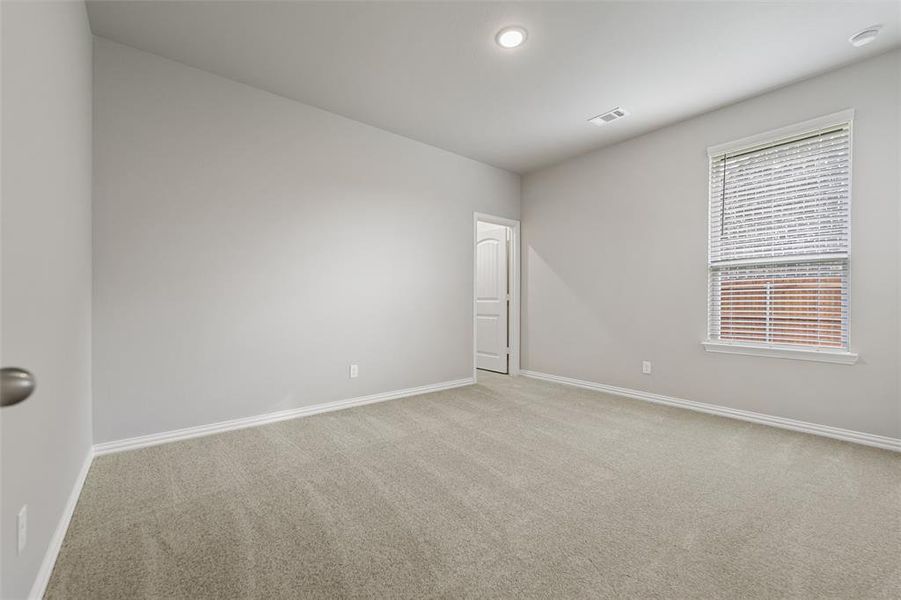 Unfurnished room featuring carpet and recessed lighting Unfurnished room featuring carpet and recessed lighting