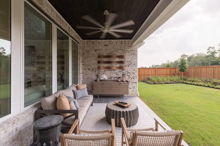 Exterior details and patio area of a home in Harvest Green 75′, Richmond (Image 4).