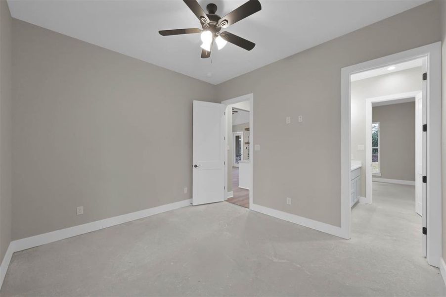 Bedroom 3 with views into the hallway and bathroom.