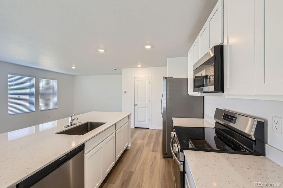 Furnished interior view inside a new home in Copper Chase: The Celestial Collection, Colorado Springs (Image 5).
