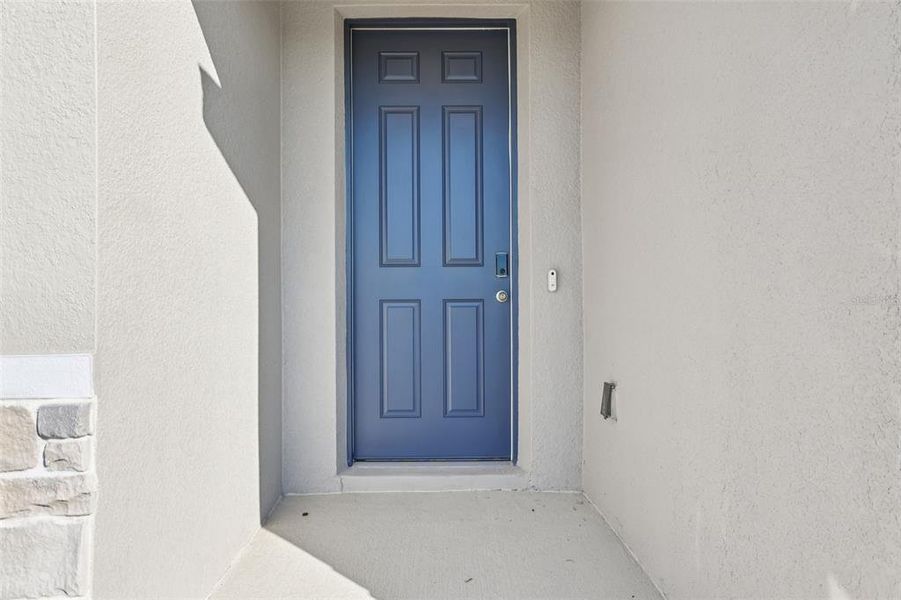 Exterior details and patio area of a home in The Meadow at Crossprairie, St. Cloud (Image 19).