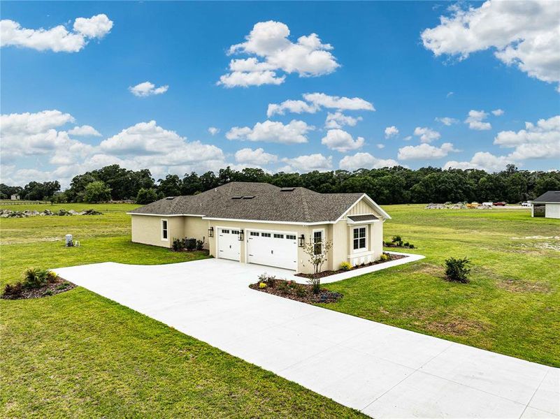 Front exterior of a new home in , Oxford, FL, highlighting curb appeal (Image 24).