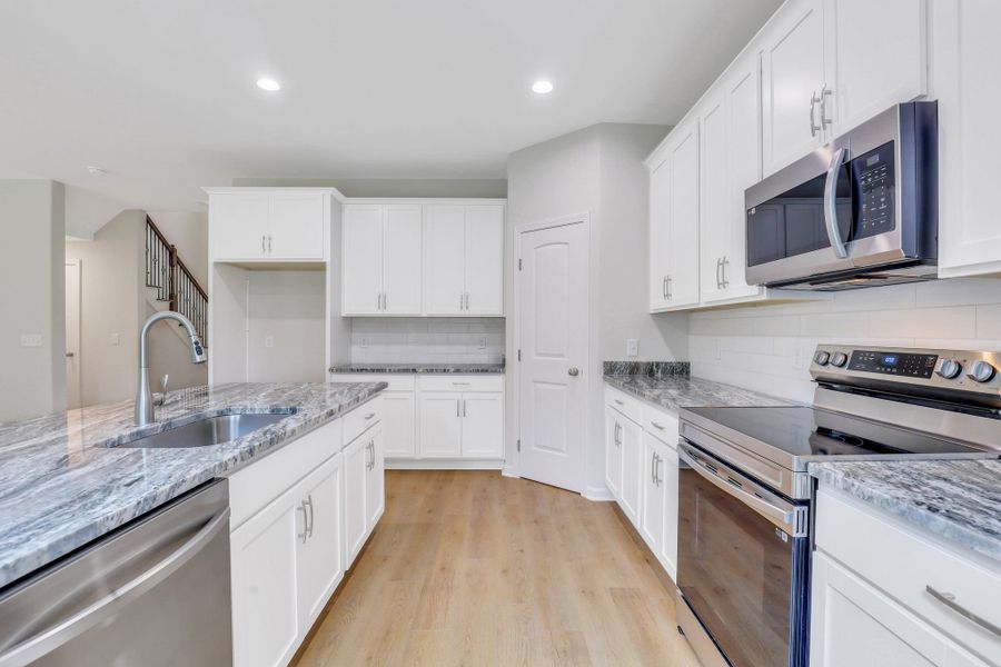 Representative furnished interior of a home built from the The Brookhaven by Smith Family Homes in Ramsey Landing, Rincon (Image 12).