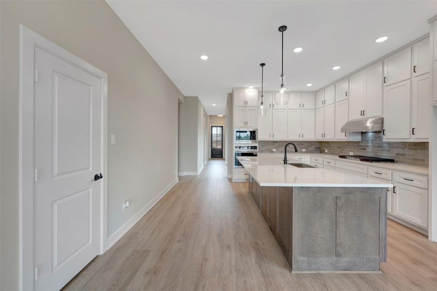 Furnished interior view inside a new home in COLTON - Reserve Collection, Todd Mission (Image 31).