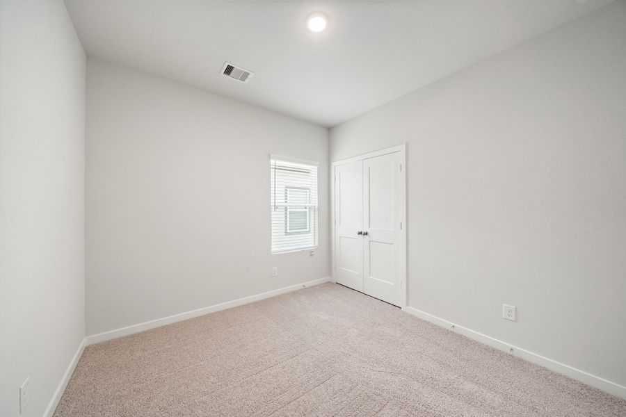 A room with white doors.