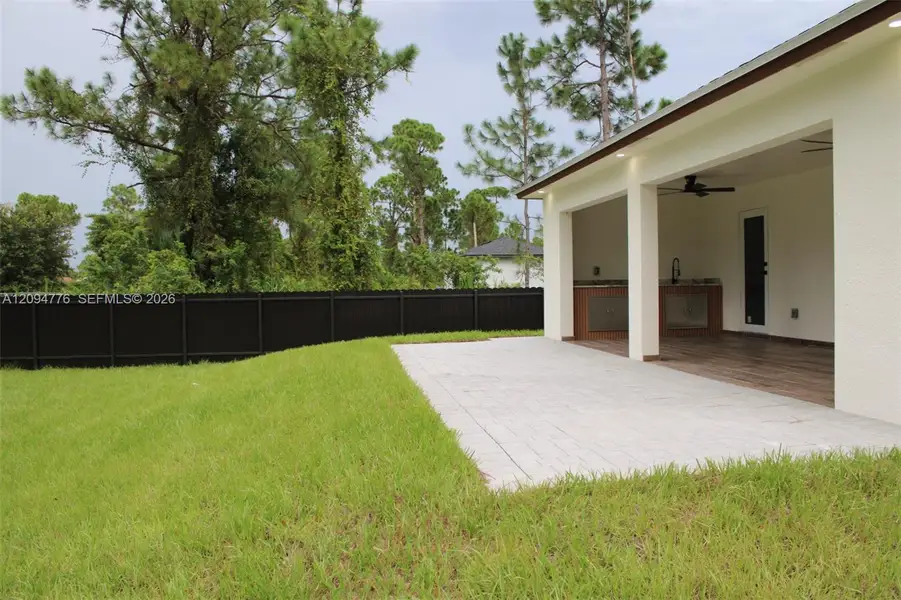 Exterior details and patio area of a home in , Lehigh Acres (Image 3).