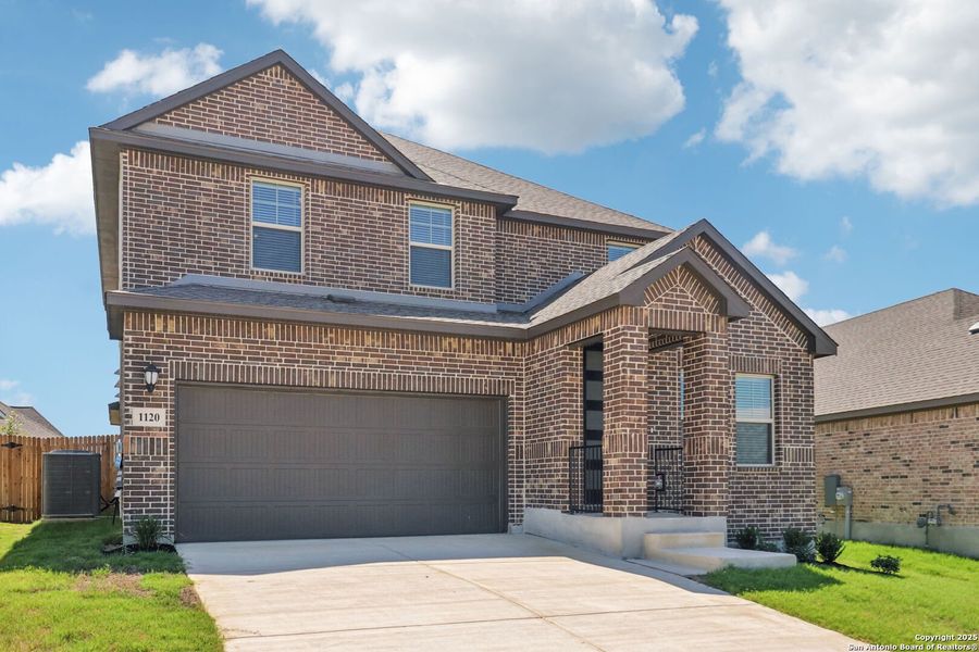 Front exterior of a new home in Arcadia Ridge - Premier Series, San Antonio, TX, highlighting curb appeal (Image 22).