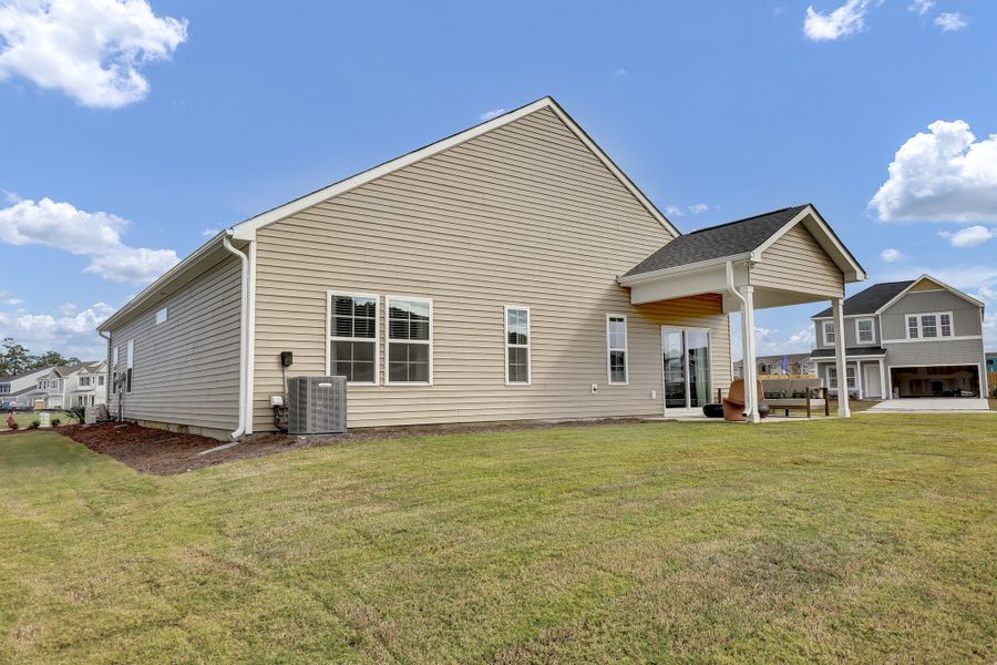 Exterior details and patio area of a home in Citadel Point at Southbridge, Sneads Ferry (Image 21).