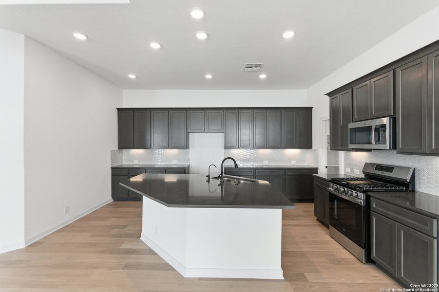 Furnished interior view inside a new home in The Crossvine – Garden Homes, Schertz (Image 8). Furnished interior view inside a new home in The Crossvine – Garden Homes, Schertz (Image 8).
