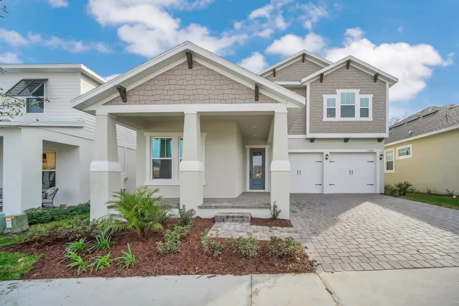 Representative exterior photo of a completed home built from the Frost by Rockwell Homes in Northlake at Ovation, Winter Garden, FL (Image 2). Representative exterior photo of a completed home built from the Frost by Rockwell Homes in Northlake at Ovation, Winter Garden, FL (Image 2).
