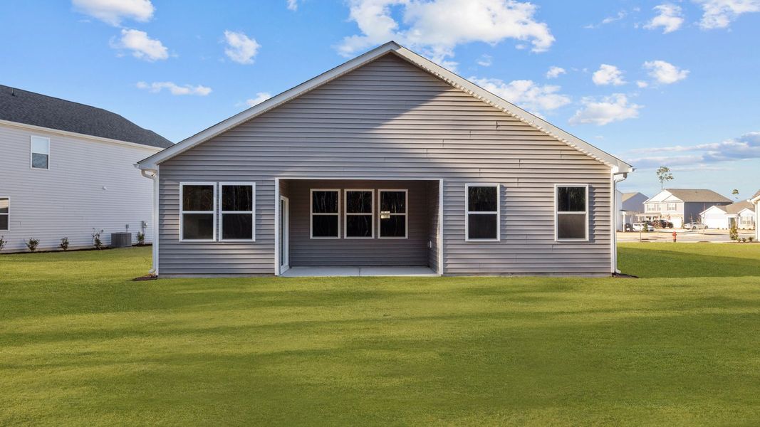 Exterior details and patio area of a home in West New Bern, New Bern (Image 22).