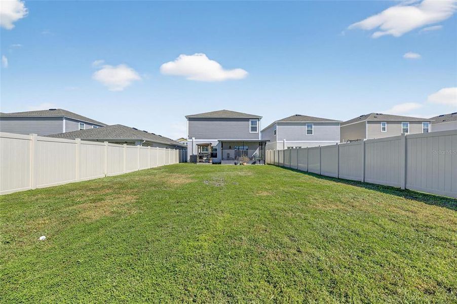 Exterior details and patio area of a home in Pasadena Point, Wesley Chapel (Image 21).