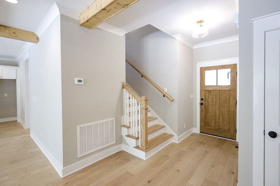 Spacious, unfurnished interior of a new home in Baker Road, Birchwood (Image 48).