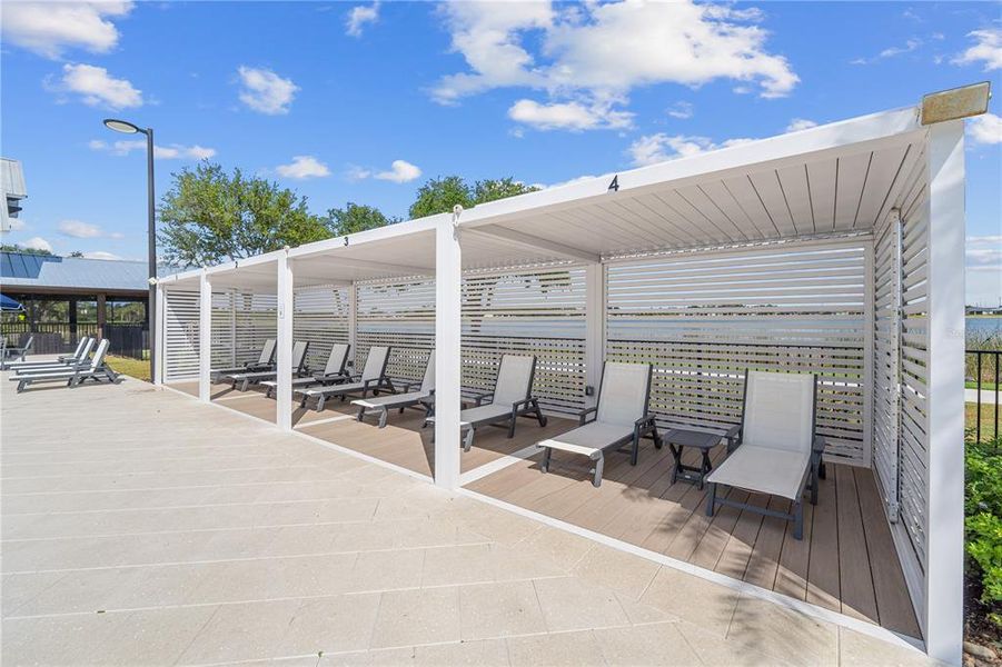 Front exterior of a new home in Tuckers Cove: Villas, Punta Gorda, FL, highlighting curb appeal (Image 30).