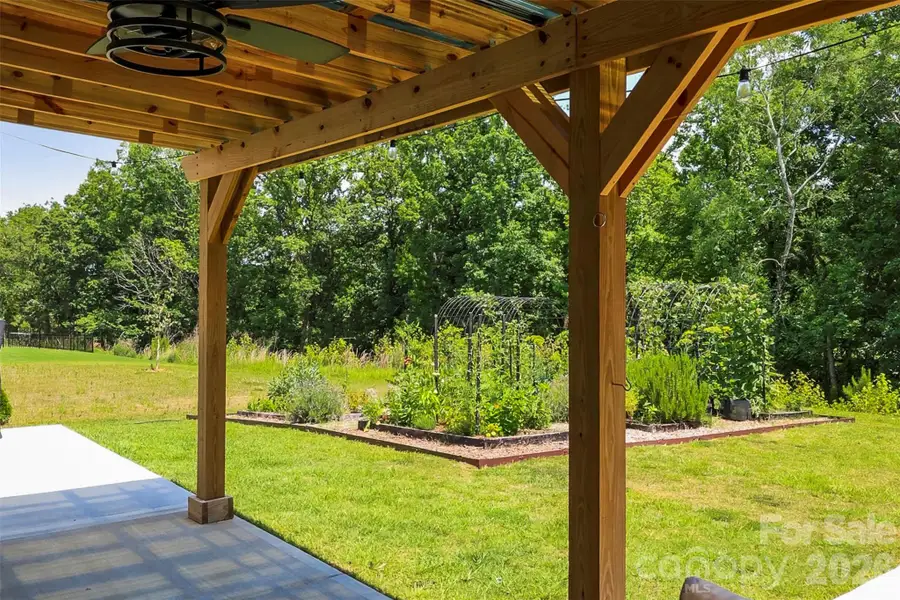 Exterior details and patio area of a home in Bailey's Run, Rock Hill (Image 24).