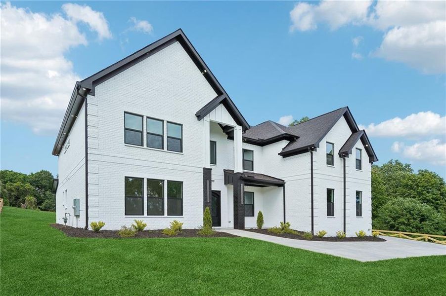 Front exterior of a new home in , Braselton, GA, highlighting curb appeal (Image 22). Front exterior of a new home in , Braselton, GA, highlighting curb appeal (Image 22).