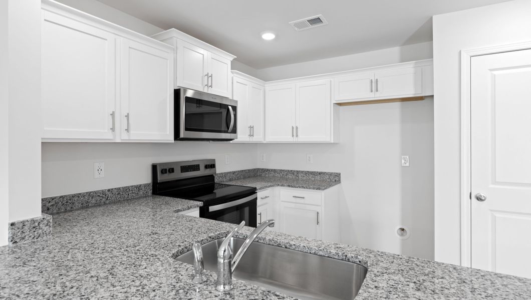 Furnished interior view inside a new home in Chestnut Ridge Townhomes, Greenville (Image 7).