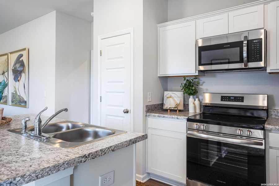 Furnished interior view inside a new home in Red Hawk Landing, San Antonio (Image 8).