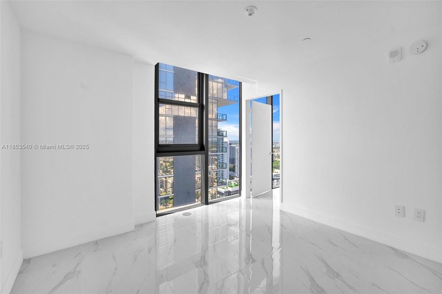 Spacious, unfurnished interior of a new home in Aria Reserve, Miami (Image 31). Spacious, unfurnished interior of a new home in Aria Reserve, Miami (Image 31).
