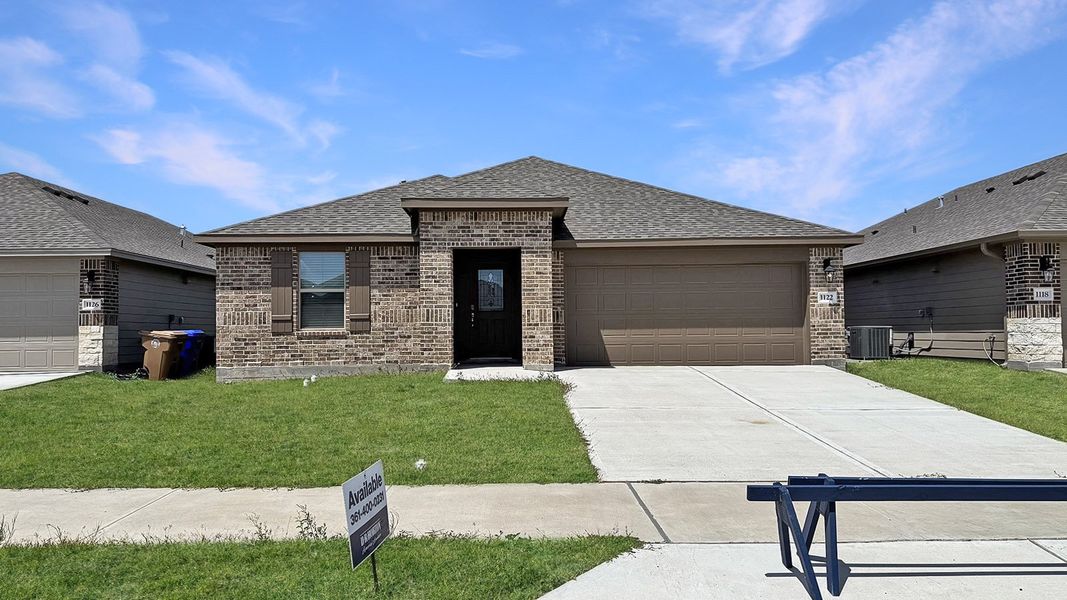 Front exterior of a new home in London Towne, Corpus Christi, TX, highlighting curb appeal (Image 1). Front exterior of a new home in London Towne, Corpus Christi, TX, highlighting curb appeal (Image 1).