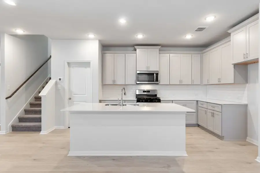 Furnished interior view inside a new home in Sage Hollow, Kyle (Image 6). Furnished interior view inside a new home in Sage Hollow, Kyle (Image 6).