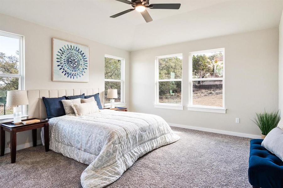 Primary bedroom with great views of the natural surroundings