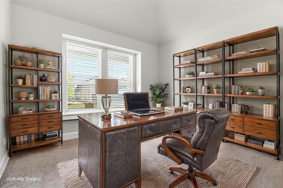 Office featuring baseboards and dark aggregate flooring Office featuring baseboards and dark aggregate flooring