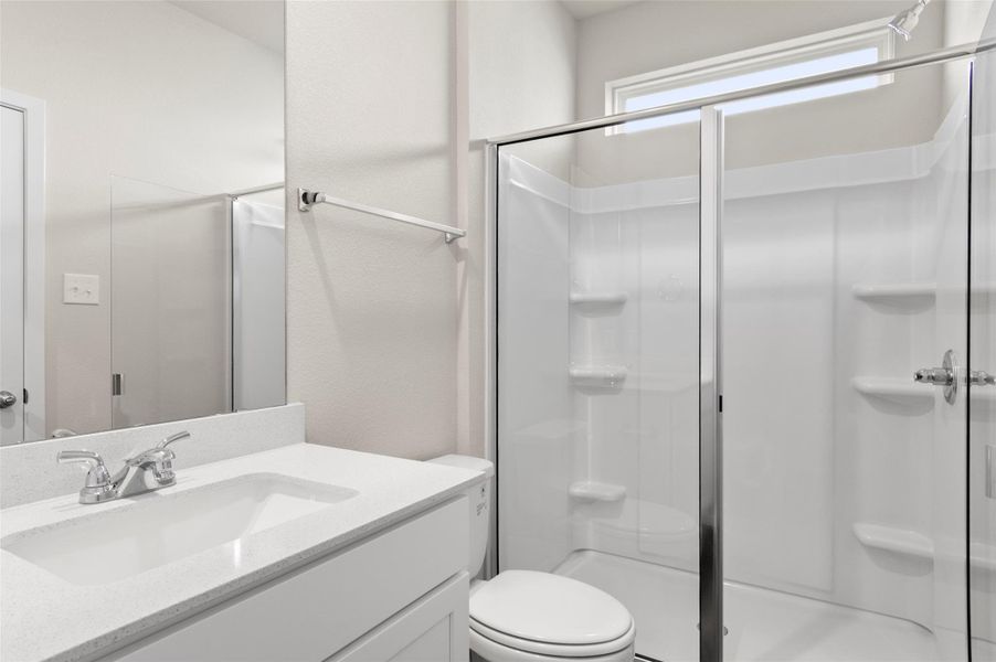 Full bath with a stall shower and vanity Full bath with a stall shower and vanity