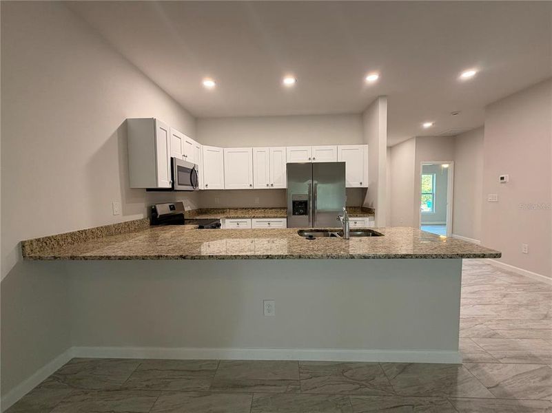 Furnished interior view inside a new home in , Port Charlotte (Image 6). Furnished interior view inside a new home in , Port Charlotte (Image 6).