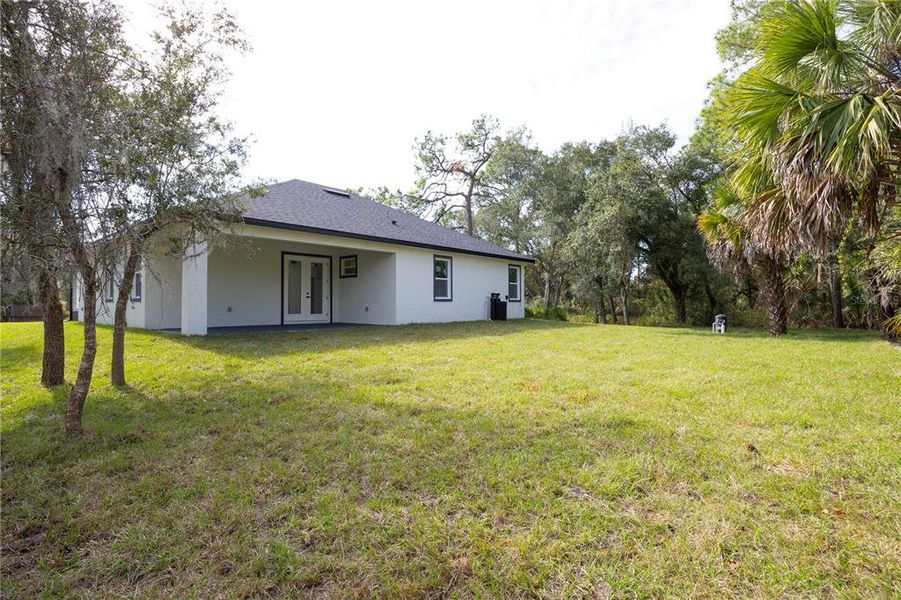 Exterior details and patio area of a home in , Port Charlotte (Image 3).