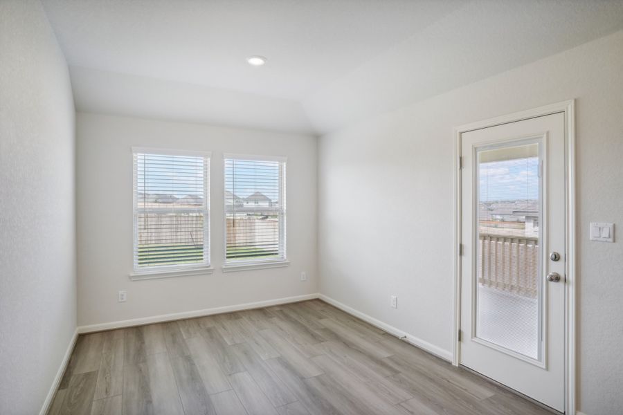 Dining room in the Callaghan floorplan at a Meritage Homes community.