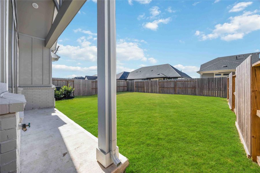Exterior details and patio area of a home in Sienna, Missouri City (Image 4). Exterior details and patio area of a home in Sienna, Missouri City (Image 4).