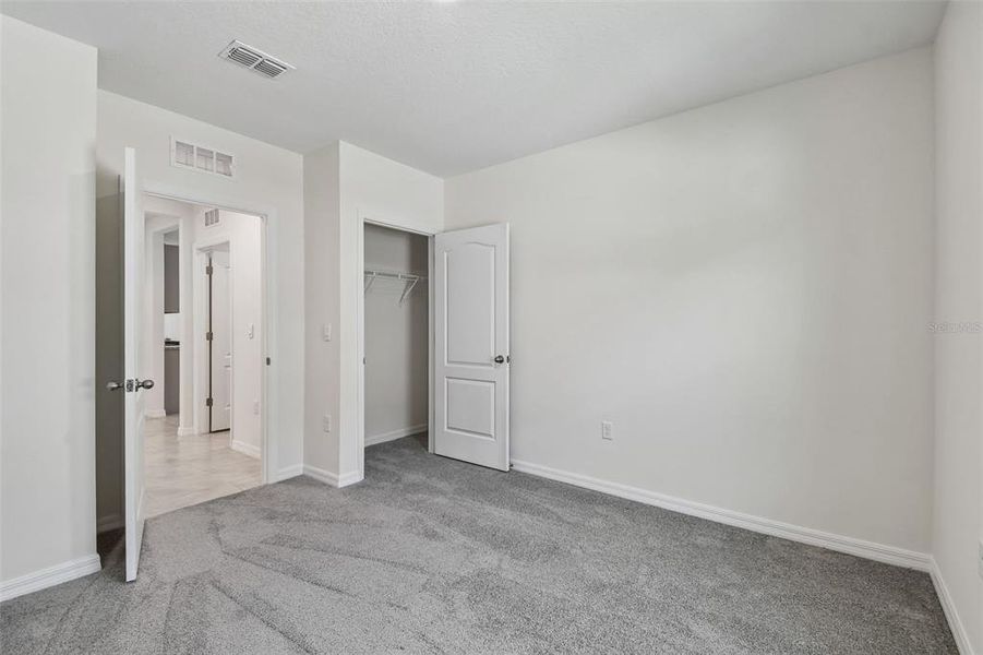 Spacious, unfurnished interior of a new home in Riviera Bella, Debary (Image 43).