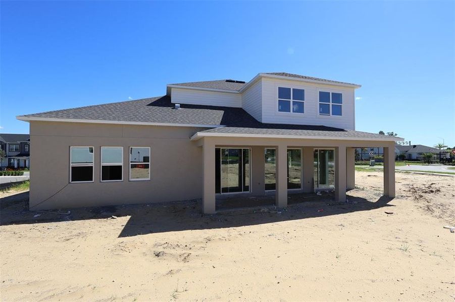 Exterior details and patio area of a home in Emerson Pointe, Apopka (Image 13). Exterior details and patio area of a home in Emerson Pointe, Apopka (Image 13).