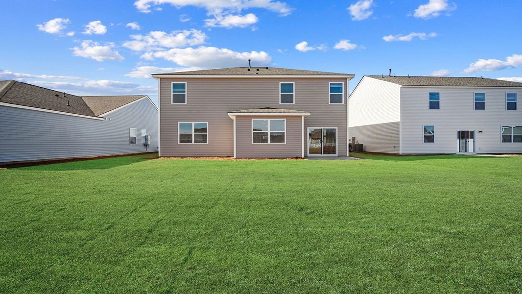 Exterior details and patio area of a home in The Retreat at East Argent, Ridgeland (Image 3).