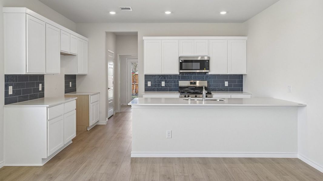 Representative furnished interior of a home built from the Cambridge by D.R. Horton in Magnolia at Legacy Hills, Celina (Image 6).