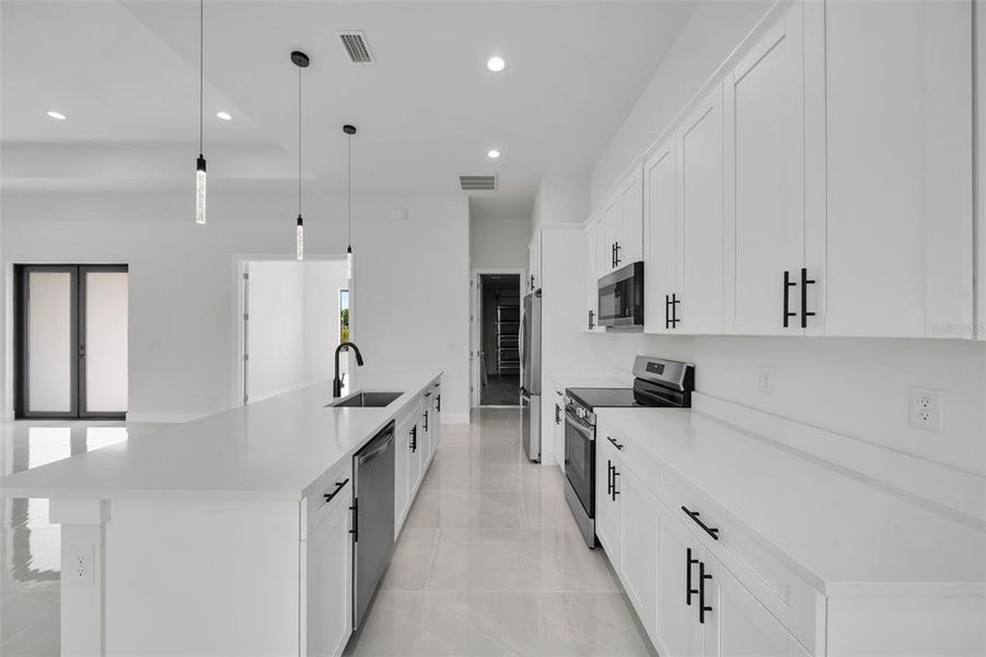 Furnished interior view inside a new home in , Port Charlotte (Image 8). Furnished interior view inside a new home in , Port Charlotte (Image 8).