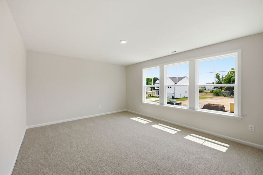 Spacious, unfurnished interior of a new home in The Farm at Neill's Creek, Lillington (Image 24).