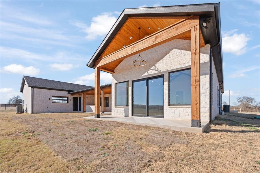 Exterior details and patio area of a home in , Godley (Image 26).