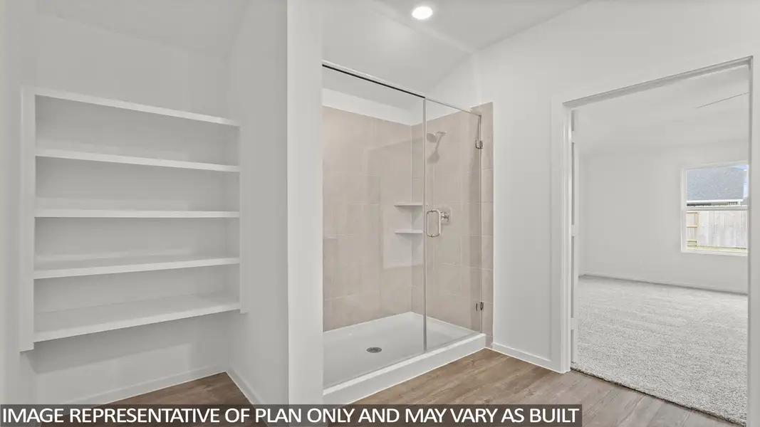 Furnished interior view inside a new home in Sunterra, Katy (Image 11).