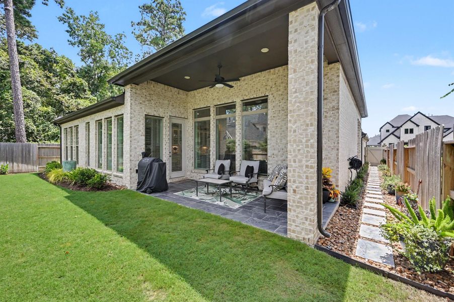 The seller has added extensive landscape beds and created a stone walkway with pavers on this side of the house. It's all been done so all you have to do is enjoy it! The seller has added extensive landscape beds and created a stone walkway with pavers on this side of the house. It's all been done so all you have to do is enjoy it!