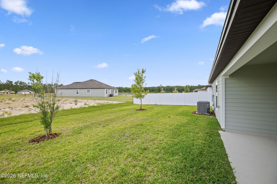 Exterior details and patio area of a home in Westport Landing, Jacksonville (Image 24).