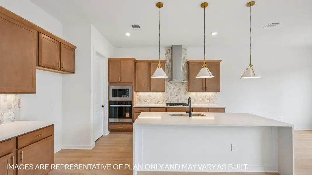 Furnished interior view inside a new home in The Enclave at Bar W Ranch, Leander (Image 7).