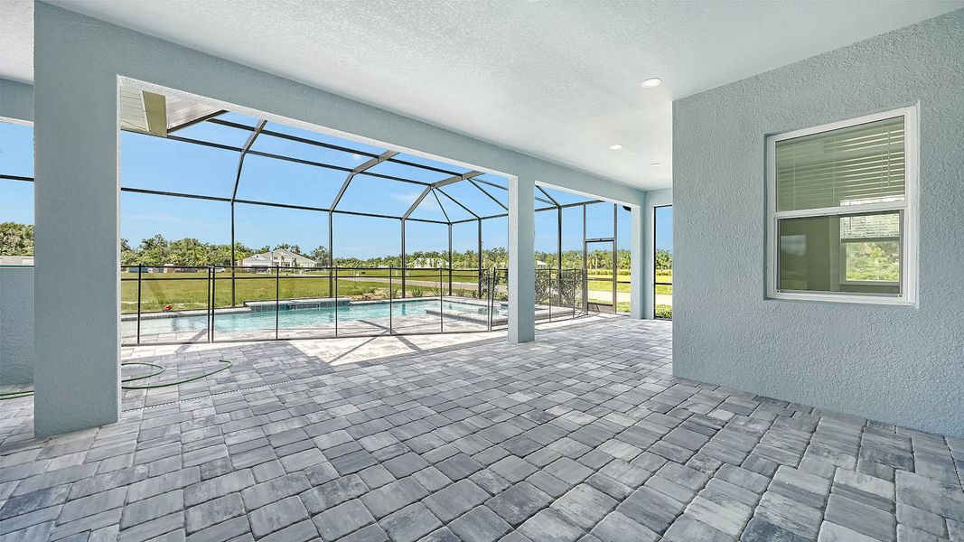 Exterior details and patio area of a home in Canoe Creek Real Estate and Homes for Sale in Parrish, FL - Neal Communities, Parrish (Image 32).